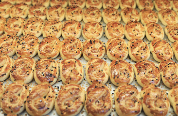 A cookie is a baked or cooked snack or dessert that is typically small, flat, and sweet. 