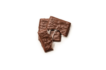 Dark chocolate candies isolated on white background.