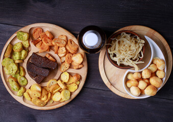 Beer snacks on a wooden table. various snacks.