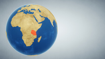 Earth globe with country of Tanzania highlighted in red. 3D illustration. Elements of this image furnished by NASA