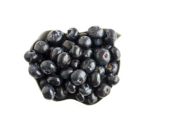 Assortment of red fruits, strawberries, blueberries and raspberries, close up