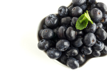 Assortment of red fruits, strawberries, blueberries and raspberries, close up