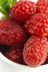 Assortment of red fruits, strawberries, blueberries and raspberries, close up