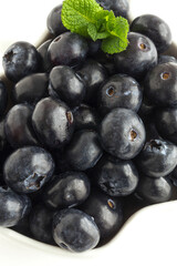 Assortment of red fruits, strawberries, blueberries and raspberries, close up
