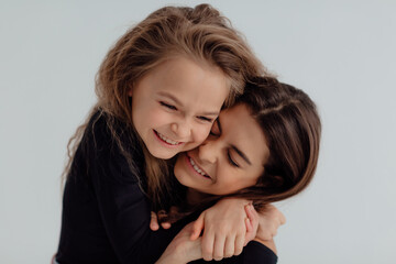 Ukrainian happy sisters hug each other. Concept of love and peace