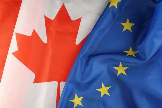 EU and Canada flag close-up