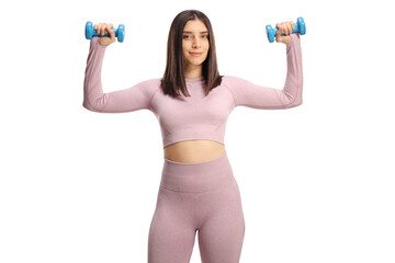 Fototapeta na wymiar Fit young female exercising with dumbbells