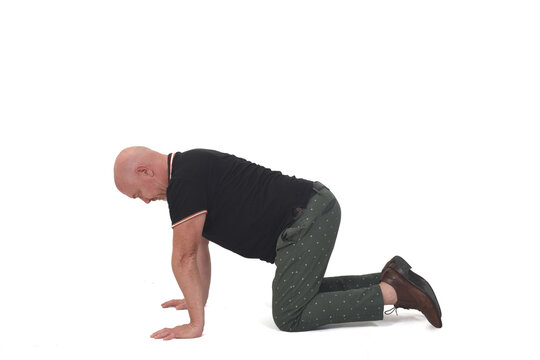 man on all fours on white background