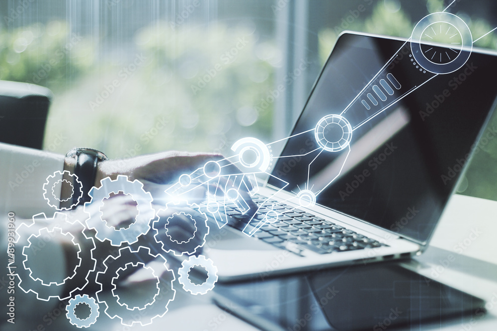 Aufkleber Double exposure of robotics technology hologram and hands typing on laptop on background. Research and development software concept