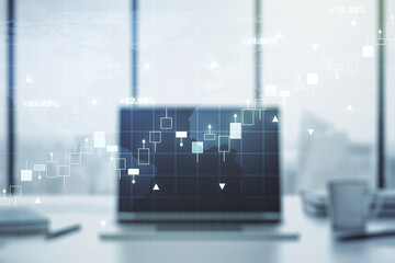 Abstract creative financial graph with world map on modern laptop background, forex and investment concept. Multiexposure