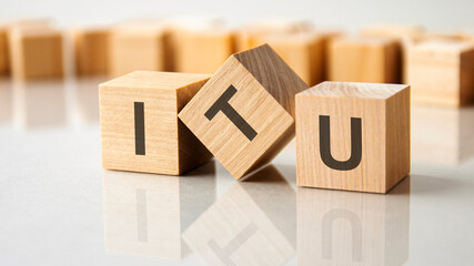 business conceptual word collected of wooden elements with the letters ITU