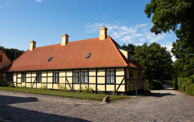 Fototapeta na wymiar Colorful old historic country house in Denmark. Traditional Scandinavian houses.