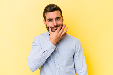 Young caucasian man isolated on yellow background doubting between two options.