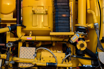Abstract of yellow and black industrial machinery