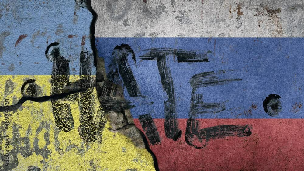 Poster Ukrainian and russian flag painted on concrete wall with the text hate on top. war and conflict concept between russia, nato and ukraine 2022.