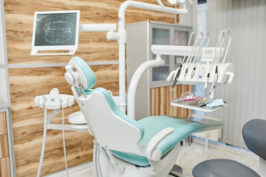 Background image of modern dental chair with tools and equipment in clinic, copy space