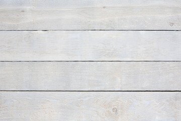 Naklejka premium Close up of old weathered wood planks. Flat lay, horizontal, rustic, wooden boards. White, grey colour.
