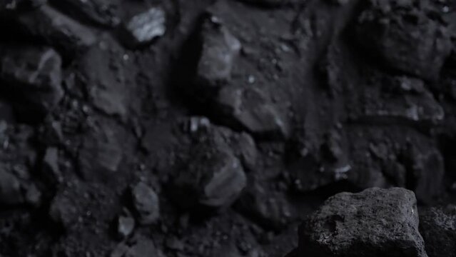 Heap of coal. Coal in a bucket.