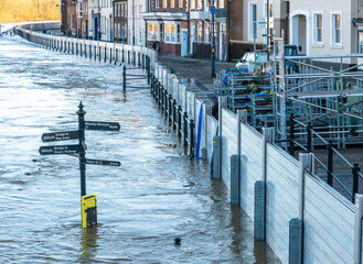 Flooding at Bewdley, major flood waters submerge pathways and threaten local residents in UK tourist town.