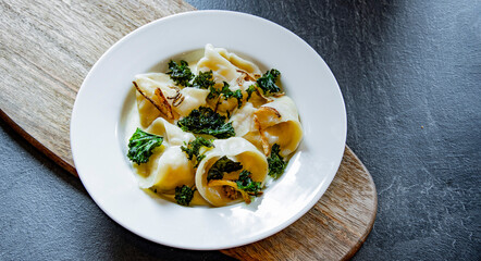 A plate of traditional East European dumplings, Pierogi