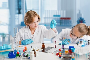 Diversity children doing a chemical experiment in laboratory . Happy kids at elementary school learning science chemistry . Chemistry school concept.