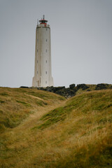 Malarrif lighthouse on the cliff near the ocean in Western Iceland. Snaefellsnes (Snæfellsnes) peninsula