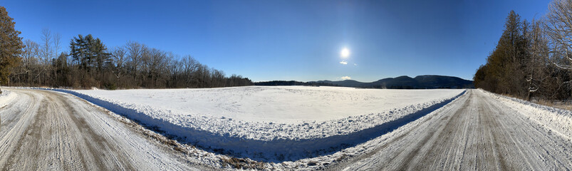 Fototapeta na wymiar Panoramic scenic view of a path in winter in the Adirondacks