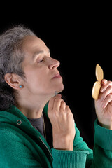 Woman plucking facial hair