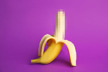 Fresh banana on purple background. Sex concept - obrazy, fototapety, plakaty