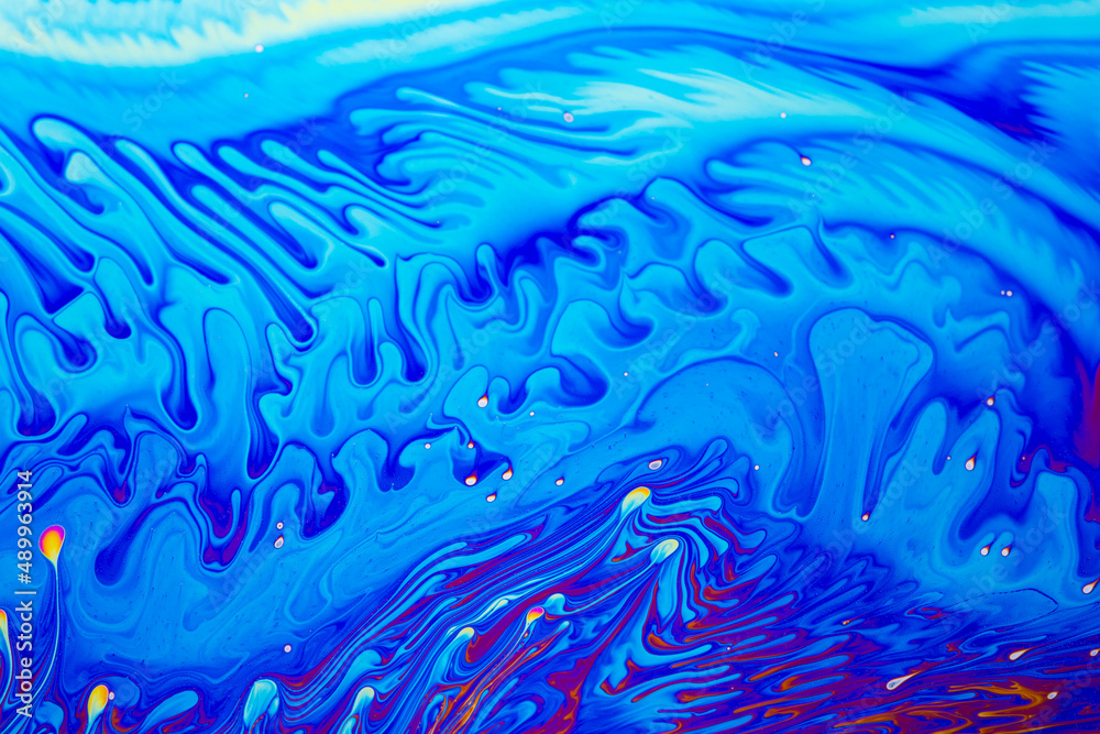 Wall mural psychedelic multicolored background abstract. rainbow colors. patterns background. photo macro shot 