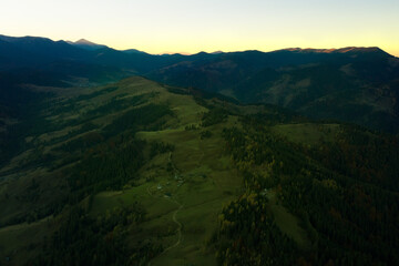 Fototapeta premium Beautiful mountains and forest in morning. Drone photography