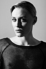 Elegantly alluring. Black and white image of a beautiful woman posing in casual wear. © Sanne B/peopleimages.com
