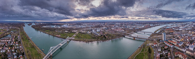 Fototapeta na wymiar Drone panorama over the Rhain and the French city of Strasbourg during the day with cloudy sky