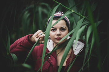 Model shooting among the leaves in nature