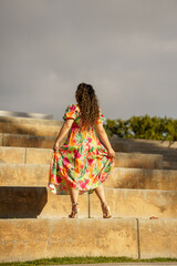 She is showing off her dress