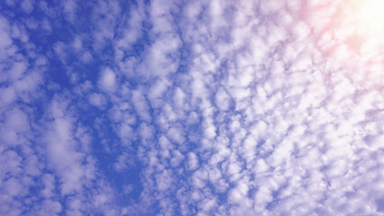 blue sky Bright sunlight with natural white clouds for background or illustration.