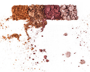 Broken things of beauty. Studio shot of crushed eyeshadow against a white background.