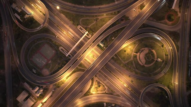 4K : Aerial hyperlapse drone shot of fast moving Highway road. Timelapse of cars
