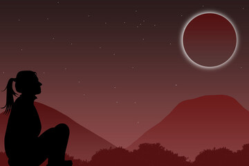 silhouette of a couple kissing, alone in the mountains