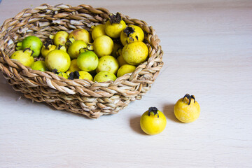 yellow araçá inside a basket