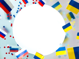 Obraz premium National flags of Russia and Ukraine on a foggy background. The concept of patriotism, freedom and memory. The conflict between the two countries