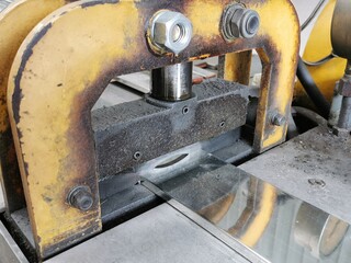 hydraulic copper busbar and aluminium cutting machine in factory.