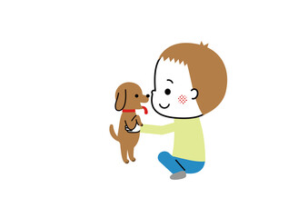 子犬を抱え上げる男の子