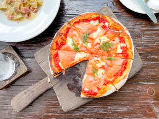 smoked salmon pizza on tray