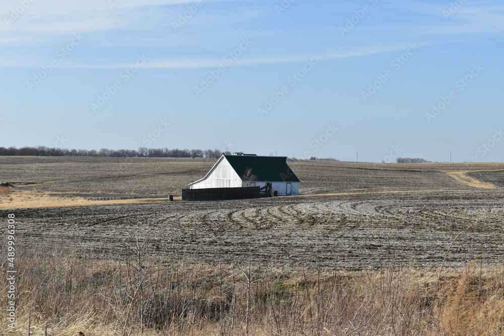 Sticker barn in a farm field