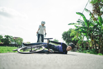 female cyclist having an accident on the road