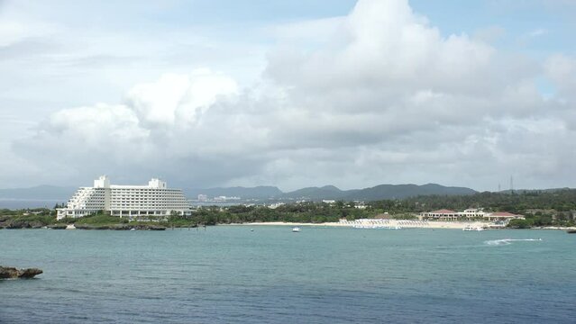 ONNA-SON, OKINAWA, JAPAN - AUGUST 2021 : View of Manza beach (Ocean or sea) in daytime. Summer holiday, vacation and resort concept video.