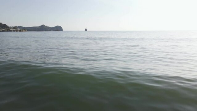 The long, sandy and tropical coastline of Damas Island at the west coast of Costa Rica. Revealing wide angle tracking shot
