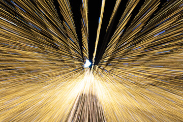 Obraz premium Festive lights in motion as an abstract background.