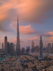 Fototapeta na wymiar Dubai Downtown skyline during sunset on a cloudy day. Dubai, United Arab Emirates.